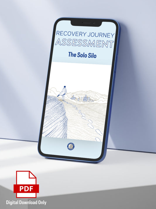 A smartphone mockup displays a digital recovery assessment cover titled 'Recovery Journey Assessment: The Solo Silo' against a light blue and white background of a figure walking alone on a sand dune looking out at a distant city. A red PDF icon with the text 'Digital Download Only' appears in the lower-left corner.